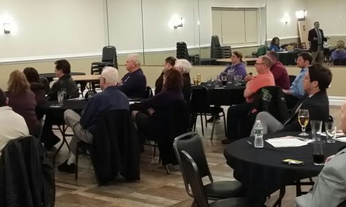 Members attending a monthly meeting